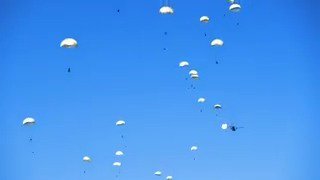 Polish paratroopers drop from Polish Air Force C-295 transport planes during exercise #SwiftResponse 18   